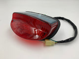TAILLIGHT UNIT (12V 18/5W | 33701MBZ611 | honda motorcycle part
